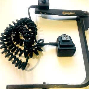 Stroboframe flip flash bracket. Older model but works the same!